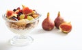 Yogurt, muesli and fresh fruits in a bowl Royalty Free Stock Photo