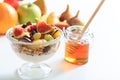 Yogurt, muesli and fresh fruits in a bowl Royalty Free Stock Photo