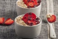 Yogurt with oat flake and fresh berries for healthy morning meal put on white wood background, Royalty Free Stock Photo