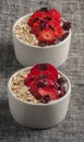 Yogurt with oat flake and fresh berries for healthy morning meal put on white wood background, Royalty Free Stock Photo