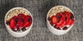 Yogurt with oat flake and fresh berries for healthy morning meal put on white wood background, Royalty Free Stock Photo