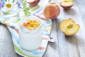 Yogurt with peaches slice. Selective focus Royalty Free Stock Photo
