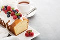 Yogurt pound cake with glaze and fresh berries Royalty Free Stock Photo