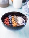 Yogurt smoothie bowl with berries, nuts, chia Royalty Free Stock Photo