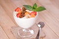 Yogurt with strawberries and banana carrot and walnuts