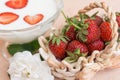 Yogurt with strawberry in glass bowl