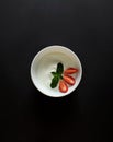 Yogurt with strawberry slices on a dark background Royalty Free Stock Photo