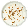 Yogurt with Sunflower Seeds Over White High Angle View