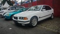 White BMW 316i E36 compact on parking lot Royalty Free Stock Photo