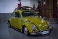 Olive green Volkswagen Beetle on display at Indonesian Custom Show Royalty Free Stock Photo