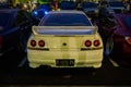 White Nissan Skyline R33 GTS-25T in a car parking lot