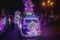 Yogyakarta, Indonesia - December 31, 2018: People ride neon cars
