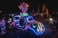 Yogyakarta, Indonesia - December 31, 2018: People ride neon cars