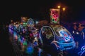 Yogyakarta, Indonesia - December 31, 2018: People ride neon cars