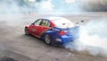 BMW E90 320i drift car in action blurry in motion