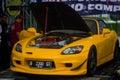 Modified yellow Honda S2000 on dyno