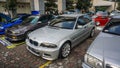 Silver BMW 325i E46 sedan on retro car meet