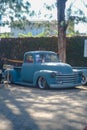 Modified blue Chevrolet 3100 truck displayed on outdoor car show Royalty Free Stock Photo