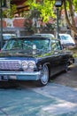 Black Chevrolet Impala sedan in Hotrodiningrat classic car show Royalty Free Stock Photo