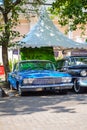 Blue Chevrolet Impala sedan in Hotrodiningrat classic car show Royalty Free Stock Photo