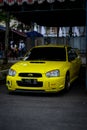 Yellow Subaru Impreza WRX STI Blobeye in car modification show Royalty Free Stock Photo