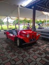 Red Mini Moke in a classic car show Royalty Free Stock Photo