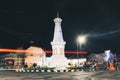Yogyakarta, Indonesia - November, 2019: Tugu Jogja or Yogyakarta Monument, Indonesia. Taken in night with vehicle traffic light. Royalty Free Stock Photo