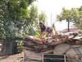 Yogyakarta, Indonesia November-22-2020: workers in landfills carrying paper waste