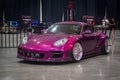 Modified purple Porsche Cayman 987 in Black Auto attle Yogyakarta 2023