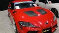 Modified red Toyota GR Supra MKV A91 in Black Auto Battle