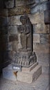 Yogyakarta, Indonesia - September 27, 2019: A beautiful ancient stone sculpture, depicting image of Surya, standing inside Pramban