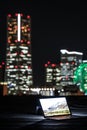 Yokohama night view and a laptop Nomad worker of the image Royalty Free Stock Photo