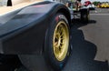 Yokohama racing tire on motorsport car in circuit starting grid low angle view