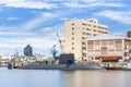 Submarine Takashio berthed in front of the JMSDF Diving Group Command in the Yokosuka naval port.