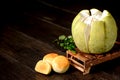 Yolk pastry egg yolk shortcake and peeled grapefruit on wooden table Royalty Free Stock Photo