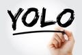 YOLO - You Only Live Once acronym with marker, concept background Royalty Free Stock Photo