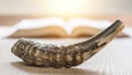 Yom Kippur and Rosh Hashanah Hashana jewish New Year holiday concept with Ram shofar horn with religious holy prayer book