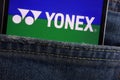 Yonex logo displayed on smartphone hidden in jeans pocket Royalty Free Stock Photo