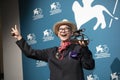 Yonfan poses with the Award for Best Screenplay Royalty Free Stock Photo