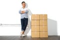 A yong asian man with boxes move house