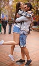 Yong love knows no boundries. Full length shot of a young couple hugging in a downtown street.