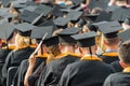 Yong student wearing graduation caps at a graduation ceremony