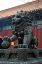 Lion and Ball Statue at the Yonghe Gong or Lama Temple, Beijing, China Royalty Free Stock Photo