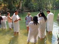 YORDANIT, ISRAEL. Group of pilgrims before ablution in holy waters of the Jordan River
