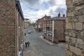 Old brick buildings at street corner on Monkgate and St Maurice Road in historic district of City of York, England, UK