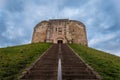 YORK, ENGLAND, DECEMBER 12, 2018: perspective view of stairway to the Clifford`s Tower castle in the historic city of