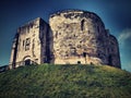 View up the steps on the motte to the ruins of the stone medieval Norman keep of York Castle known as Cliffords Tower Royalty Free Stock Photo