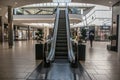 Interior view of shopping centre showing escalator