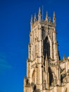 York, UK - Nov 24 2023: Built of magnesian limestone, the soaring 60m high south west tower of York Minster in northern England