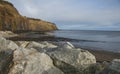 Yorkshire, England, Robin Hood`s Bay - stones on the beach. Royalty Free Stock Photo